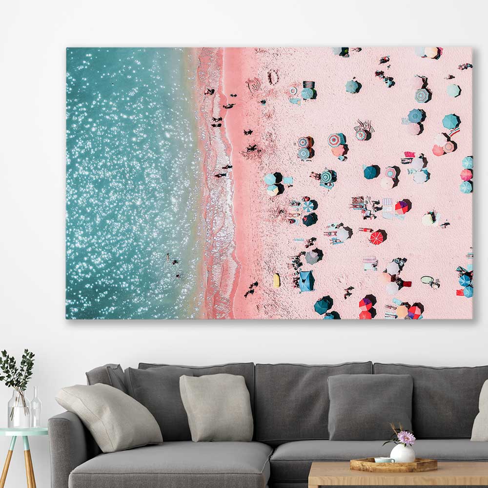 Beach and coastal wall art print of Bondi Pink Aerial on a stretched canvas displayed in a room