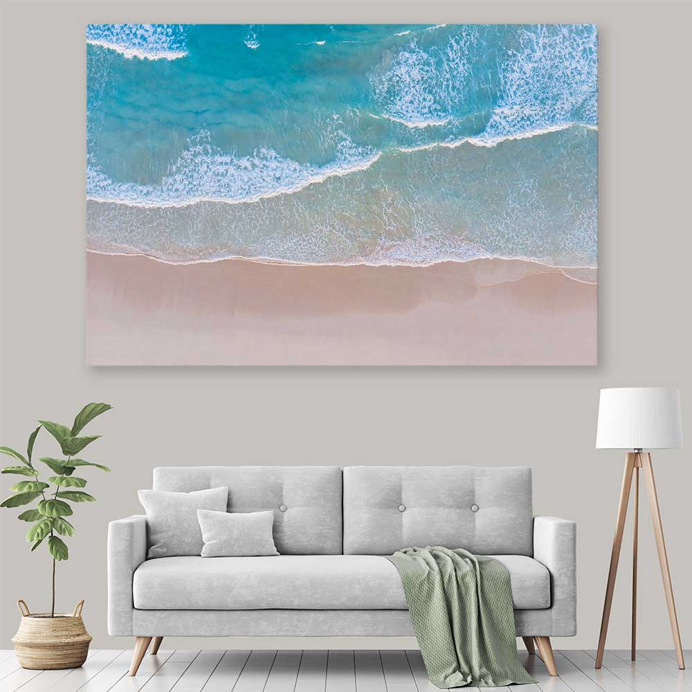 Beach and coastal wall art print of Calm Waves on a stretched canvas displayed in a room