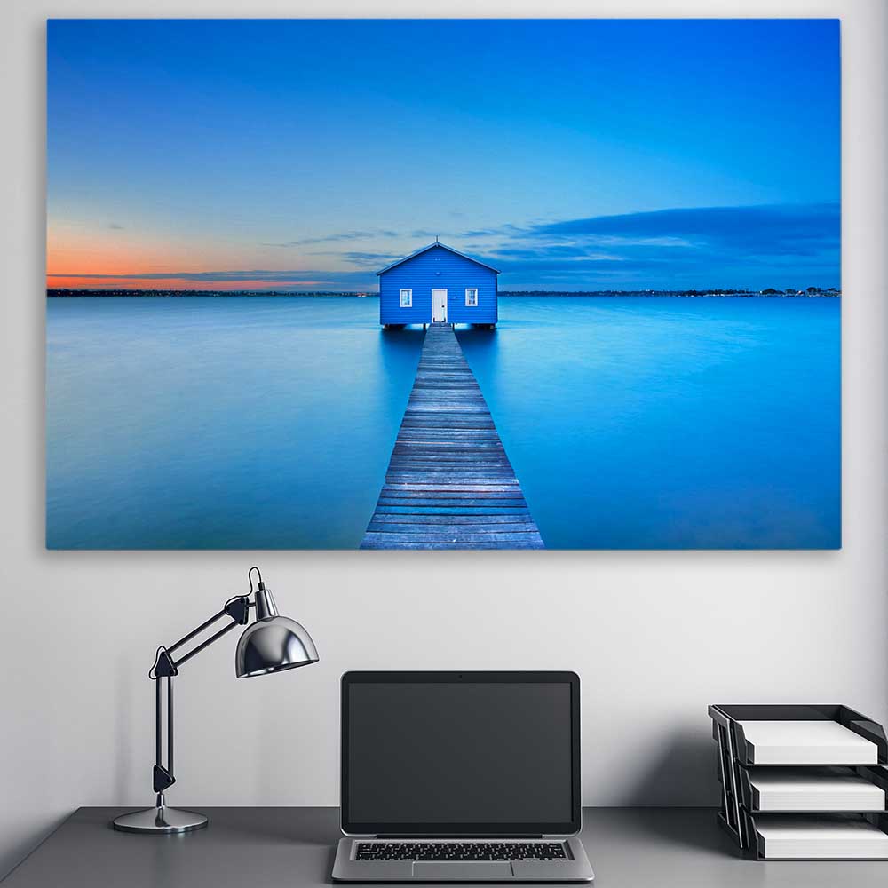 Beach and coastal wall art print of Matilda Bay Boathouse on a stretched canvas displayed in a room