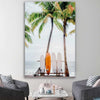 Beach and coastal wall art print of Tropical Surf on a stretched canvas displayed in a room