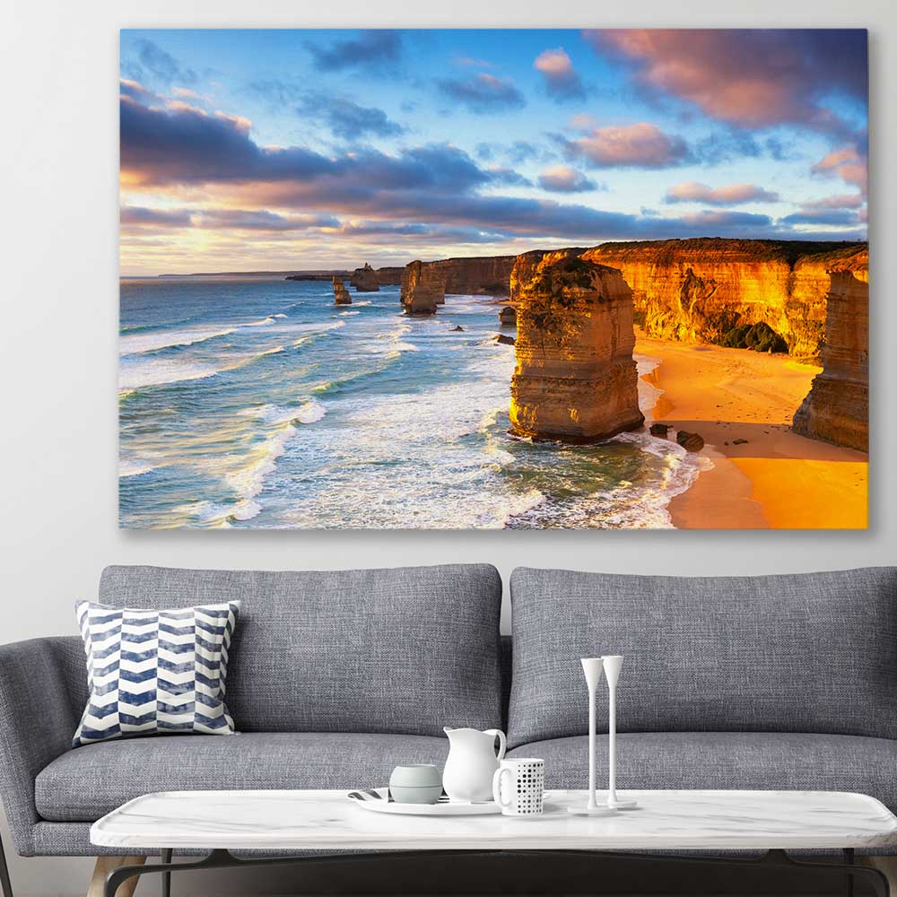 Beach and coastal wall art print of Twelve Apostles on a stretched canvas displayed in a room