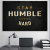 Inspirational wall art print of Stay Humble on a stretched canvas displayed in a room