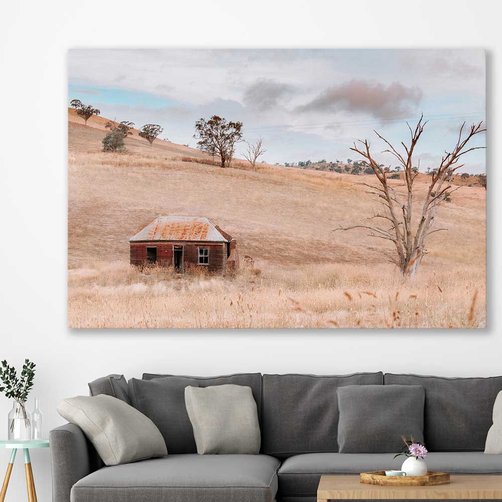 Floral print of Rural Farmhouse on a stretched canvas displayed in a room