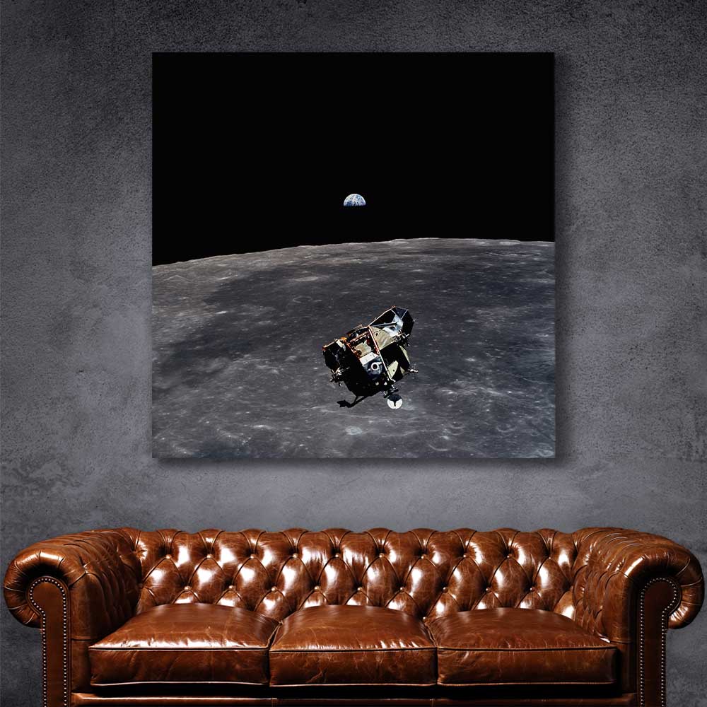 Space prints and wall art of Apollo 11 Earthrise on a stretched canvas displayed in a room