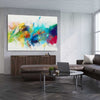 Colourful Abstract Burst stretched canvas displayed from an angle in a room - part of our high quality canvas abstract wall art collection