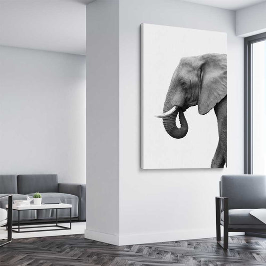 Animal wall art and canvas prints of Lone Elephant on a stretched canvas displayed from an angle in a room
