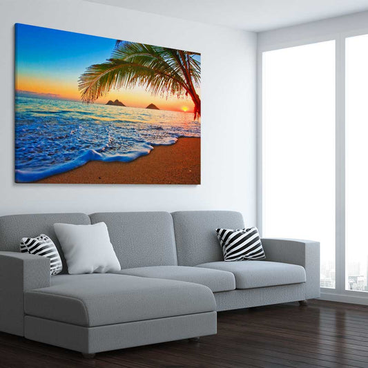 Beach and coastal wall art print of Tropical Sunset Shore on a stretched canvas displayed from an angle in a room