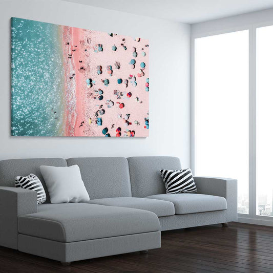 Beach and coastal wall art print of Bondi Pink Aerial on a stretched canvas displayed from an angle in a room