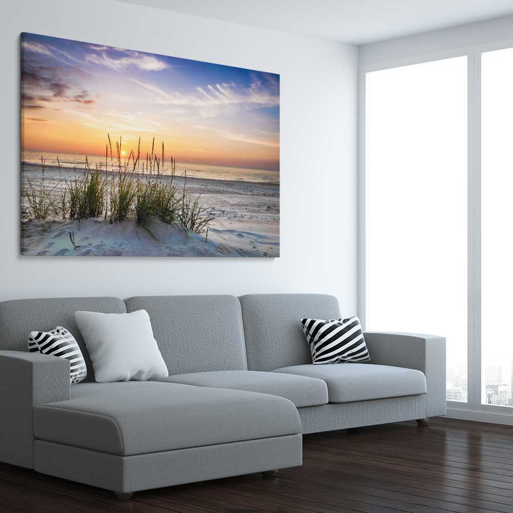 Beach and coastal wall art print of Calming Sunset on a stretched canvas displayed from an angle in a room