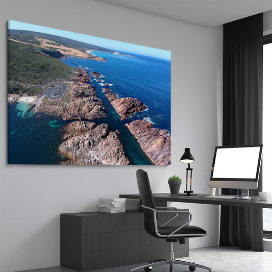 Beach and coastal wall art print of Canal Rocks Two on a stretched canvas displayed from an angle in a room