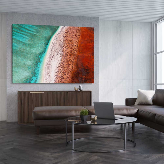 Beach and coastal wall art print of Cape Range Aerial on a stretched canvas displayed from an angle in a room
