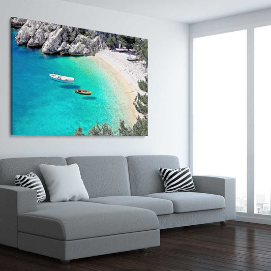 Beach and coastal wall art print of Hidden Beach on a stretched canvas displayed from an angle in a room