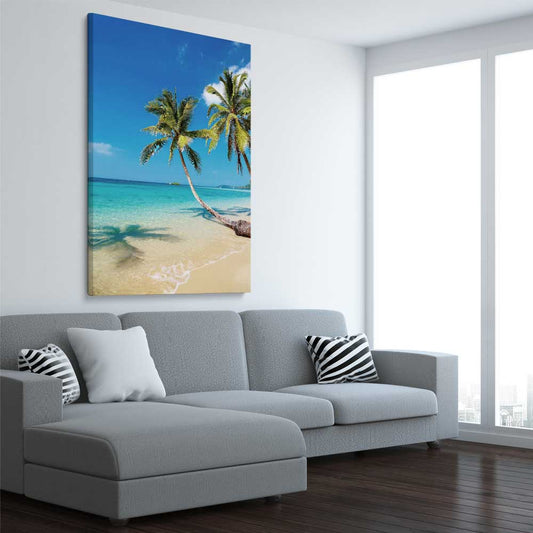 Beach and coastal wall art print of Paradise Palms on a stretched canvas displayed from an angle in a room