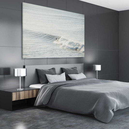 Beach and coastal wall art print of Surfing Waves on a stretched canvas displayed from an angle in a room