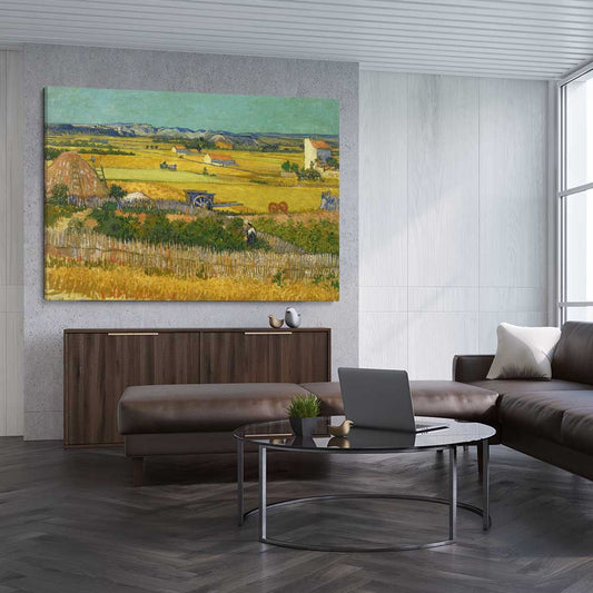 Classic wall art and canvas print of The Harvest Van Gogh on a stretched canvas displayed from an angle in a room