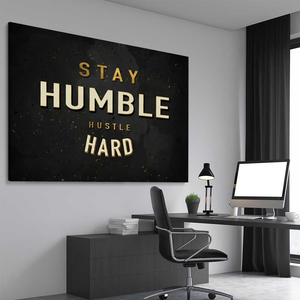 Inspirational wall art print of Stay Humble on a stretched canvas displayed from an angle in a room
