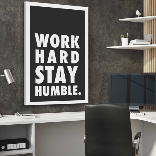 Inspirational wall art print of Work Hard on a stretched canvas displayed from an angle in a room