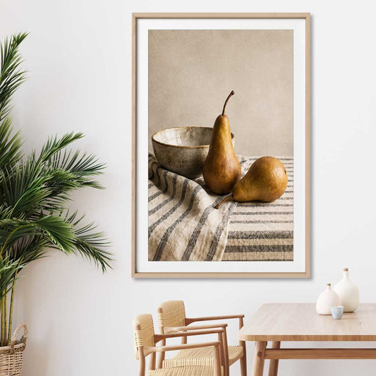 Tuscan Pears stretched canvas displayed from an angle in a room is a colourful and stylish canvas wall art and print suited for the kitchen area