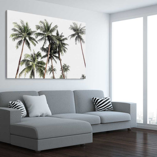 Floral print of Bright Palm Skies on a stretched canvas displayed from an angle in a room