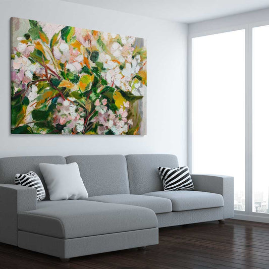 Floral print of Green Blossom on a stretched canvas displayed from an angle in a room