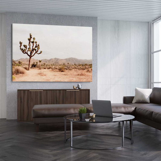 Floral print of Joshua Tree on a stretched canvas displayed from an angle in a room