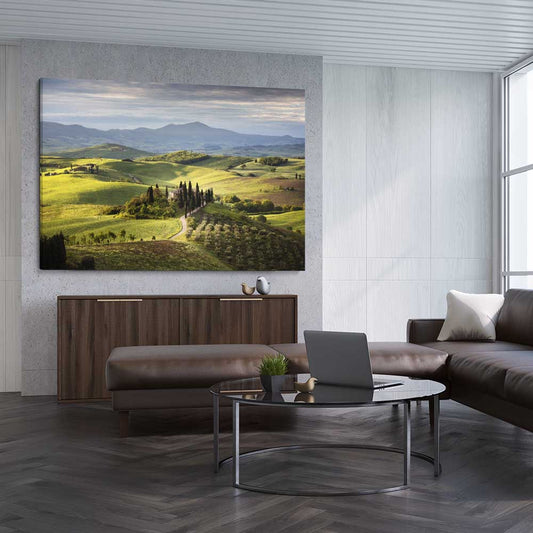 Floral print of Tuscan Countryside on a stretched canvas displayed from an angle in a room
