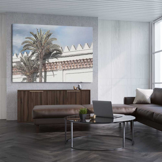 Floral print of Wanderlust Palms on a stretched canvas displayed from an angle in a room