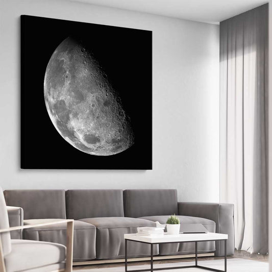 Space prints and wall art of The Moon on a stretched canvas displayed from an angle in a room