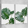 Floral print of Monstera Leaf Pair on a stretched canvas