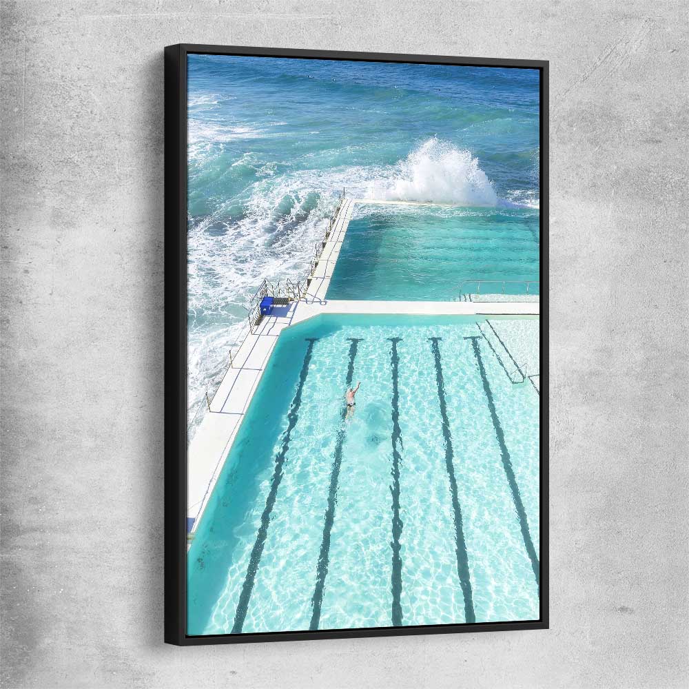 Beach and coastal wall art print of Bondi Iceberg with black framed canvas