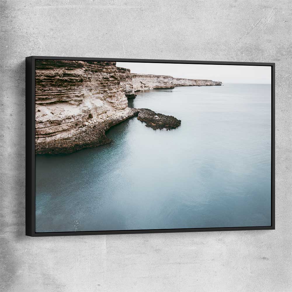 Beach and coastal wall art print of Quiet Waters with black framed canvas