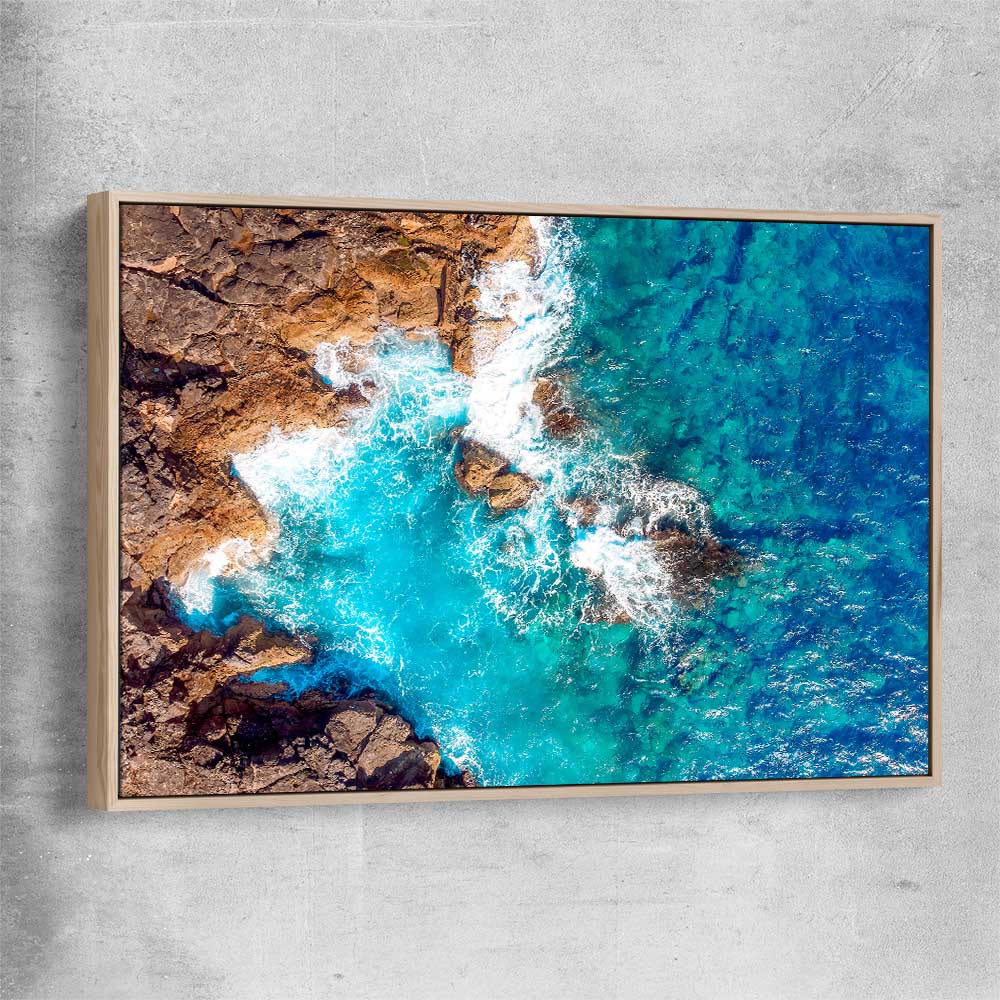 Beach and coastal wall art print of Azure Blue Sea with raw oak framed canvas