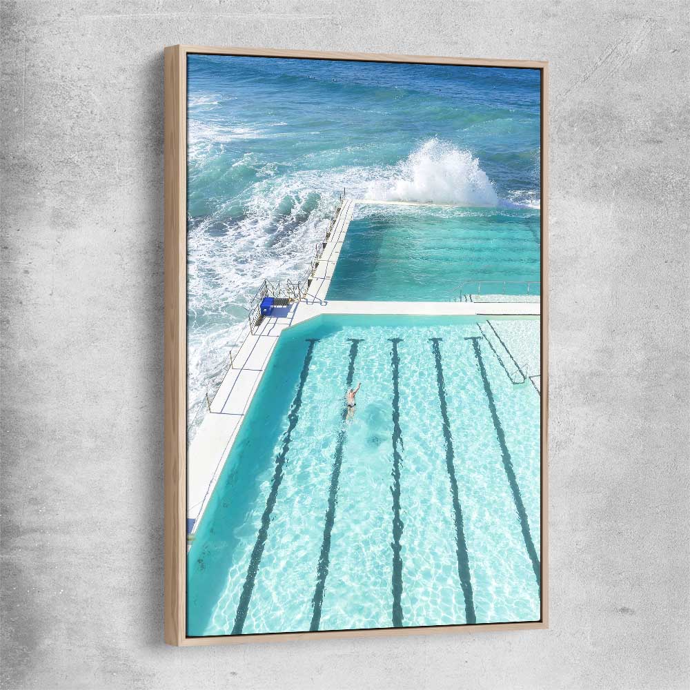 Beach and coastal wall art print of Bondi Iceberg with raw oak framed canvas