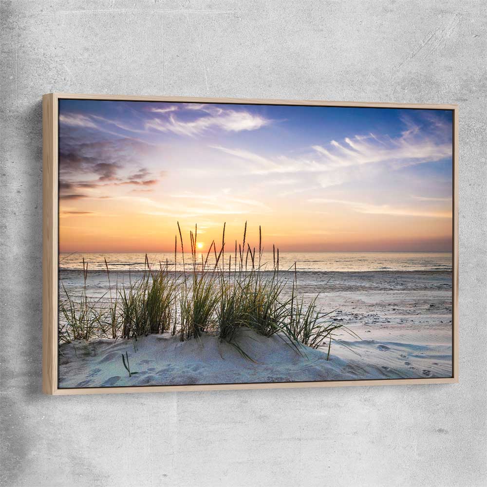 Beach and coastal wall art print of Calming Sunset with raw oak framed canvas