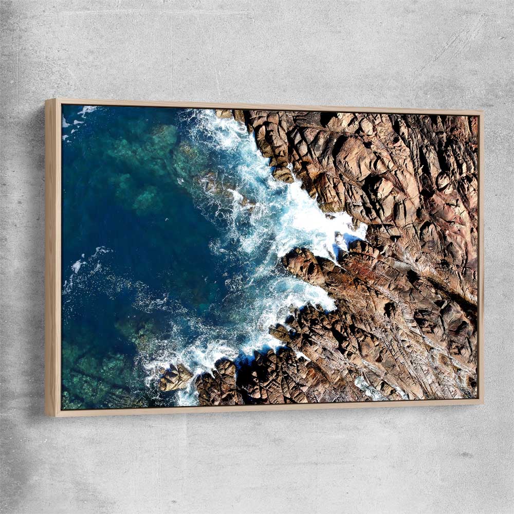 Beach and coastal wall art print of Canal Rocks One with raw oak framed canvas