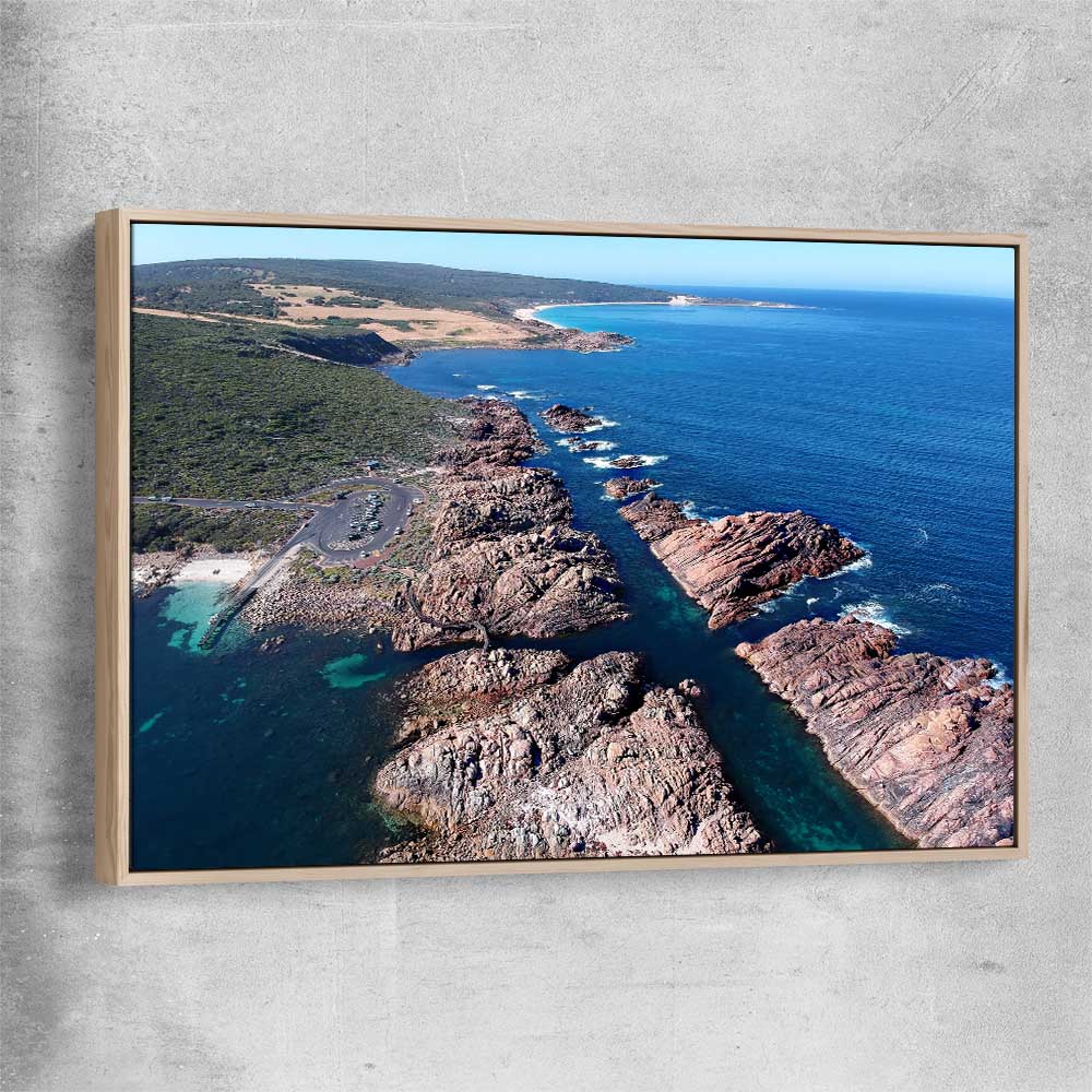 Beach and coastal wall art print of Canal Rocks Two with raw oak framed canvas