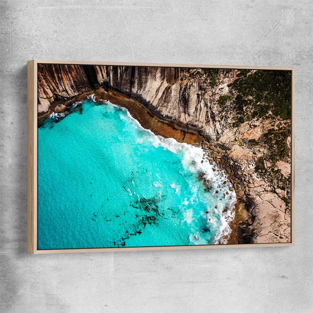 Beach and coastal wall art print of Crystal Clear Tides with raw oak framed canvas