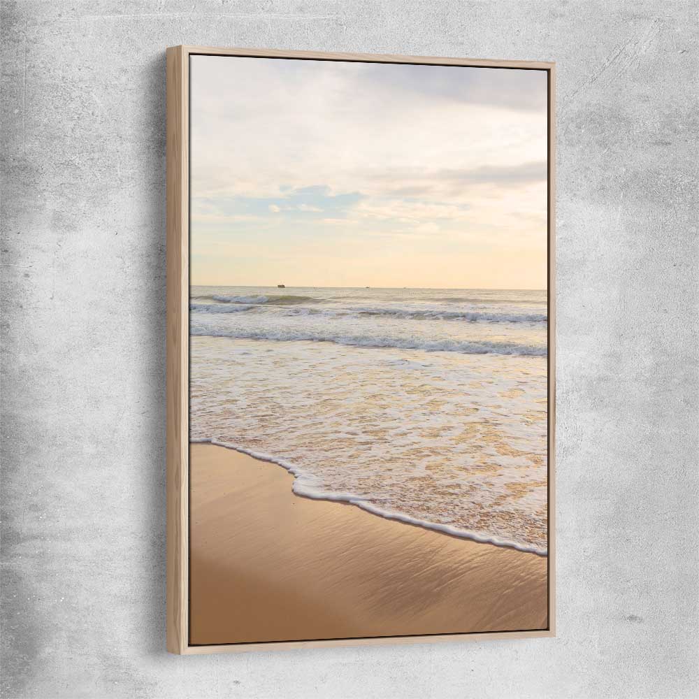 Beach and coastal wall art print of Gentle Tide with raw oak framed canvas