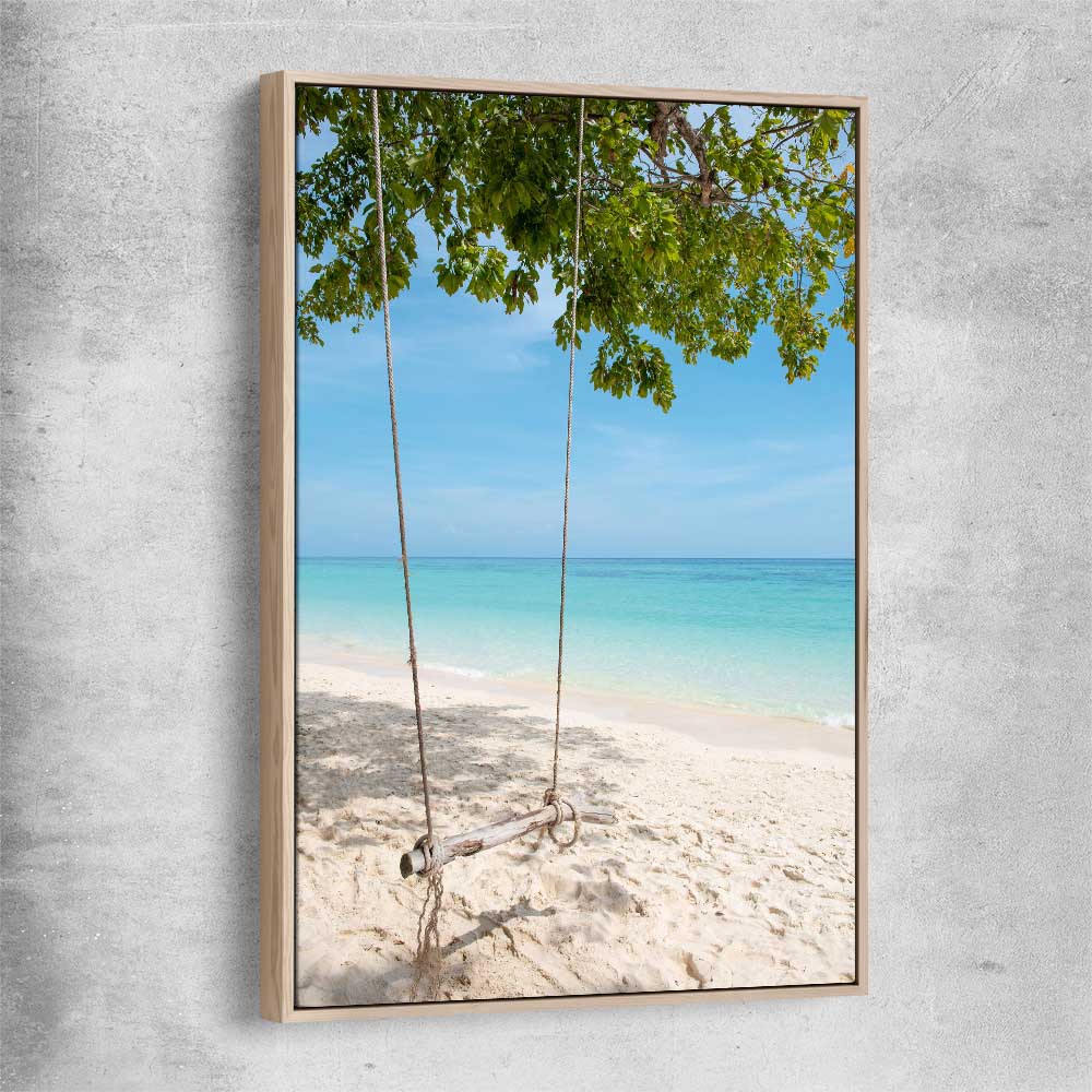 Beach and coastal wall art print of Pristine Beach Swing with raw oak framed canvas