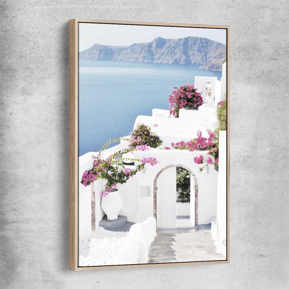 Beach and coastal wall art print of Santorini Island with raw oak framed canvas
