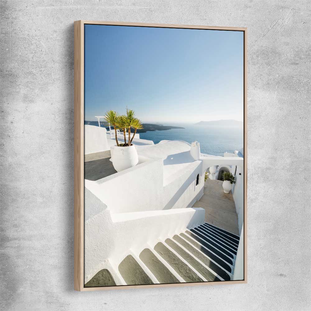 Beach and coastal wall art print of Santorini Walkway with raw oak framed canvas