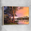 Floral print of Blissful River Sunset with raw oak framed canvas
