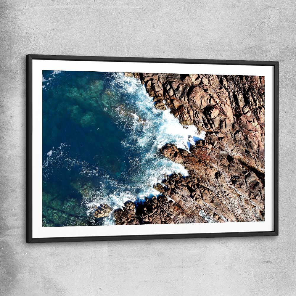 Beach and coastal wall art print of Canal Rocks One with black glass front frame
