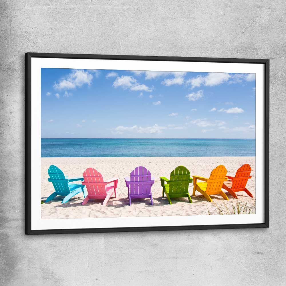 Beach and coastal wall art print of Pastel Chairs with black glass front frame