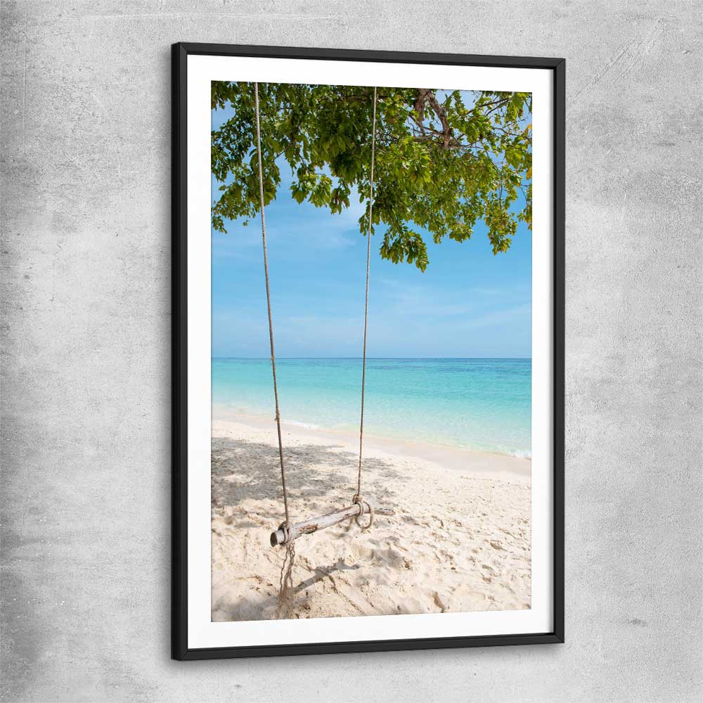 Beach and coastal wall art print of Pristine Beach Swing with black glass front frame