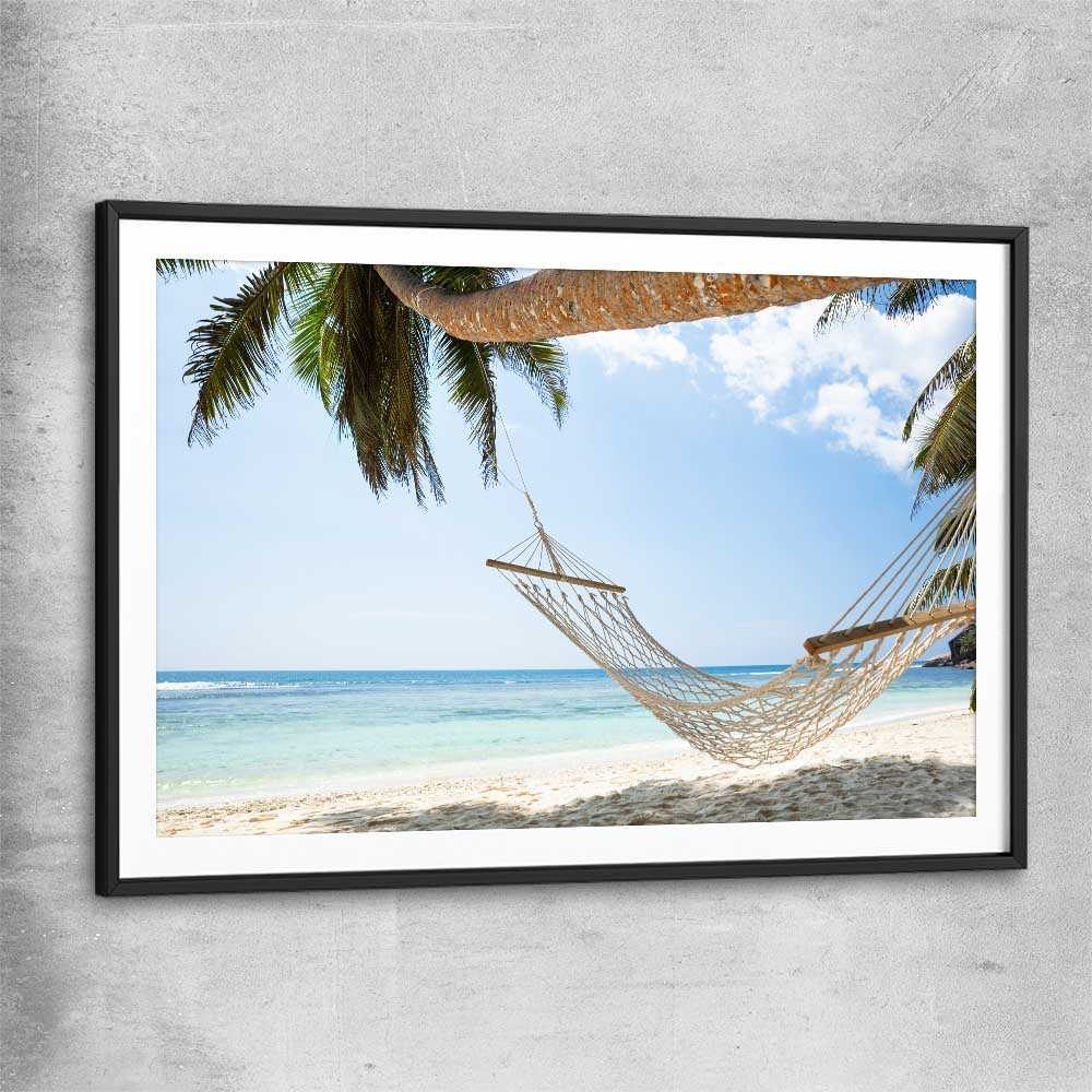 Beach and coastal wall art print of Seychelles Hammock with black glass front frame