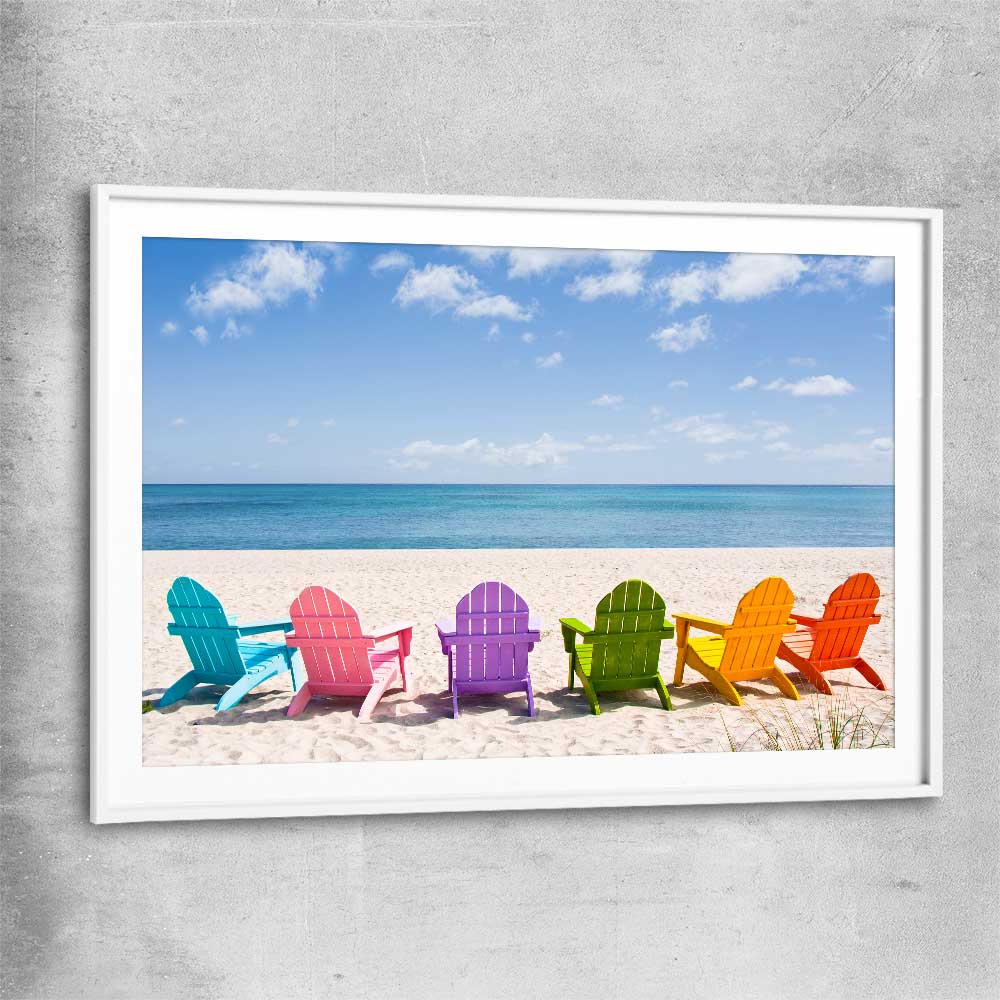 Beach and coastal wall art print of Pastel Chairs with white glass front frame