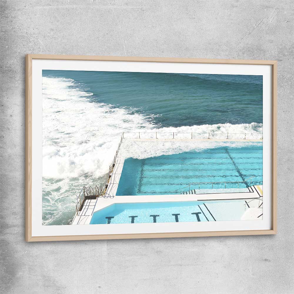 Beach and coastal wall art print of Bondi Iceberg Tide with raw oak glass front frame