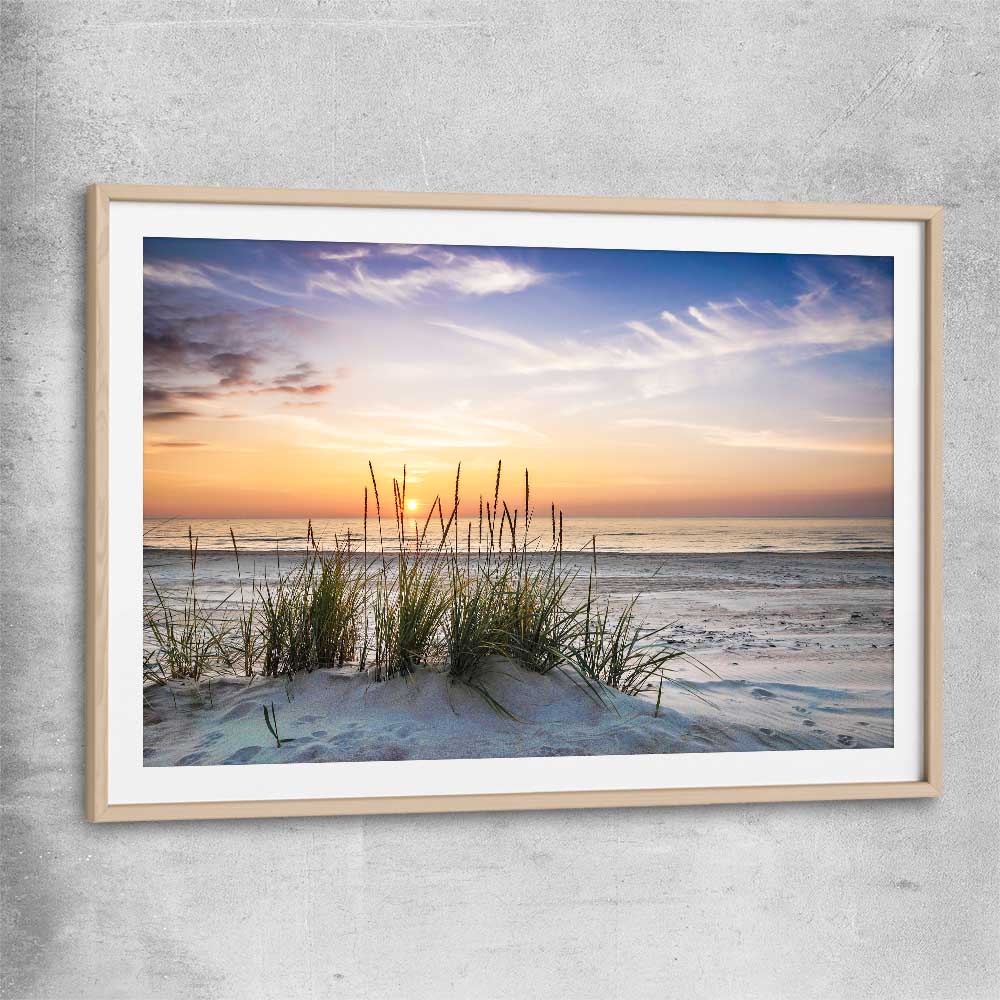 Beach and coastal wall art print of Calming Sunset with raw oak glass front frame