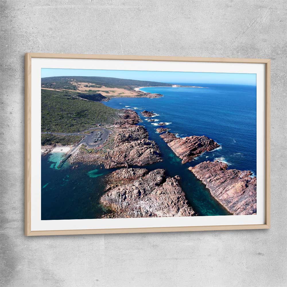 Beach and coastal wall art print of Canal Rocks Two with raw oak glass front frame